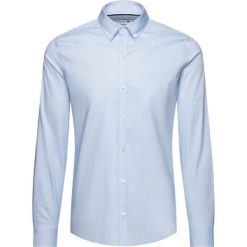 Koszula Lacoste CH0431. Niebieskie koszule męskie Lacoste, m, bez wzorów, z elastanu, casualowe, bez kołnierzyka, bez rękawów. W wyprzedaży za 269,00 zł.
