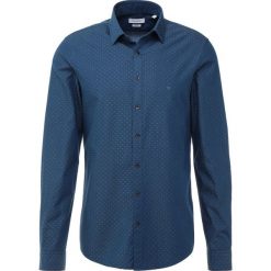 Calvin Klein CLIPS WASHED Koszula blue. Niebieskie koszule męskie Calvin Klein, m, bez wzorów, z bawełny, bez kołnierzyka, bez rękawów. Za 359,00 zł.