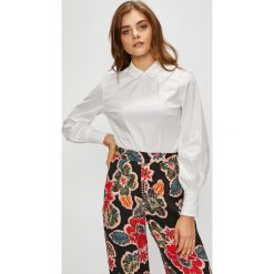 Tommy Hilfiger - Koszula. Białe koszule damskie TOMMY HILFIGER, na co dzień, bez wzorów, z bawełny, casualowe, z włoskim kołnierzykiem, z długim rękawem. W wyprzedaży za 279,90 zł.