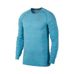 Nike M NK DF KNIT TOP LS, 10 | URUCHOMIENIE | MĘŻCZYZNA | TOP Z DŁUGIM RĘKAWEM | NIEBIESKI SZARY / ŻYWE NIEBO Z. Szare koszulki męskie Nike, m, bez wzorów, z dzianiny, sportowe, bez kołnierzyka, z długim rękawem, długie. W wyprzedaży za 229,01 zł.