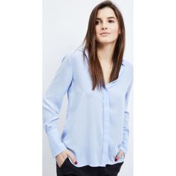 Koszula z szerokimi mankietami. Koszule damskie Moodo, s, bez wzorów, bez kołnierzyka, bez rękawów. Za 29,99 zł.