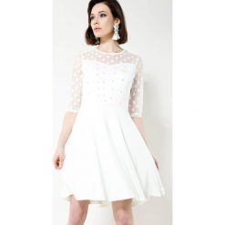 Biała Sukienka Lively Dance. Białe sukienki damskie other, s, bez wzorów, wizytowe, bez kołnierzyka, bez rękawów. Za 59,99 zł.