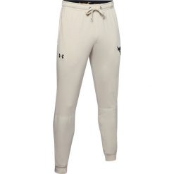 Under Armour Project Rock Spodnie dresowe Biały. Białe spodnie męskie Under Armour, xxl, bez wzorów, z bawełny, rockowe. Za 309,95 zł.