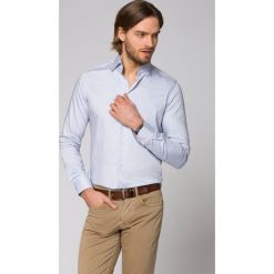 Koszula Niebieska w Mikrowzór Rovley. Niebieskie koszule męskie LANCERTO, m, bez wzorów, z bawełny, eleganckie, bez kołnierzyka, bez rękawów. W wyprzedaży za 149,90 zł.