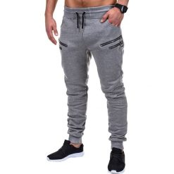 SPODNIE MĘSKIE DRESOWE P422 - SZARE. Szare spodnie dresowe męskie marki Ombre Clothing, z bawełny. Za 39,00 zł.