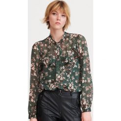 Koszula w kwiaty - Khaki. Brązowe koszule damskie Reserved, w kwiaty, bez kołnierzyka, bez rękawów. Za 79,99 zł.