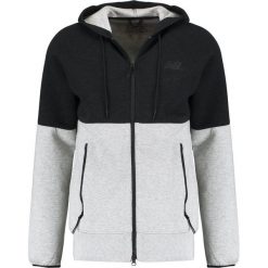New Balance Bluza rozpinana athletic grey. Szare bluzy męskie rozpinane marki New Balance, m, z bawełny. W wyprzedaży za 381,75 zł.