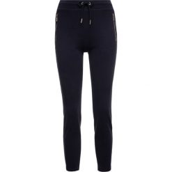 Spodnie dresowe Armani Exchange 6GYP71 YJ43Z 1593. Niebieskie spodnie damskie Armani Exchange, m, z bawełny. W wyprzedaży za 229,00 zł.