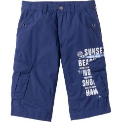 Długie bermudy bojówki Loose Fit bonprix kobaltowy. Niebieskie spodenki i szorty męskie bonprix, m, bez wzorów, długie. Za 54,99 zł.