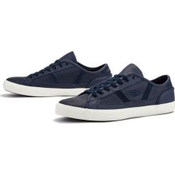 LACOSTE SIDELINE 419 1 CMA > 738CMA0047NG5. Buty sportowe męskie Lacoste, ze skóry, bez zapięcia, tenisowe. W wyprzedaży za 259,99 zł.
