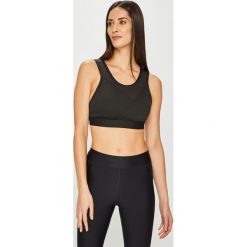 Reebok - Biustonosz. Czarne biustonosze sportowe damskie Reebok, s, bez wzorów, z elastanu. W wyprzedaży za 139,90 zł.