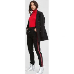 Czarno-Czerwone Spodnie Dresowe Adult Tree. Czarne spodnie dresowe damskie other, xl, z dresówki. Za 49,99 zł.