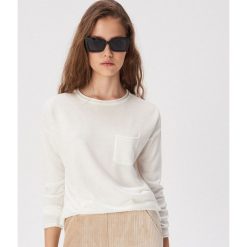 Gładki sweter z kieszenią - Kremowy. Białe swetry damskie Sinsay, s, bez wzorów, bez rękawów, bez kaptura. Za 39,99 zł.