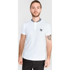 Tommy Hilfiger Polo Koszulka Biały. Białe podkoszulki męskie TOMMY HILFIGER, s, z haftami, z bawełny, polo, bez rękawów. Za 430,95 zł.