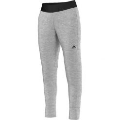 Spodnie sportowe damskie: Adidas Spodnie Tappered Pant szare r. S (AJ6343)