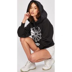Reebok Classic - Bluza. Czarne bluzy damskie Reebok Classic, s, z nadrukiem, z elastanu, bez rękawów, z kapturem. W wyprzedaży za 199,90 zł.