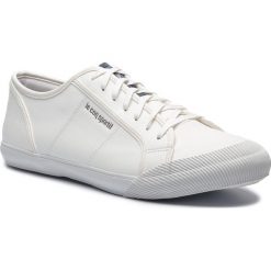 Sneakersy LE COQ SPORTIF - Deauville Winter Craft 1820484 Optical White/Dress Blue. Białe półbuty męskie le coq sportif, bez zapięcia. W wyprzedaży za 209,00 zł.