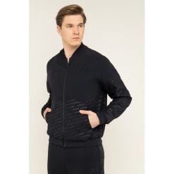 Kurtka bomber Under Armour Ua Unstoppable Emboss 1345551. Czarne kurtki męskie Under Armour, xxl, bez wzorów, z elastanu, bez kaptura. W wyprzedaży za 199,00 zł.