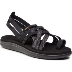 Sandały TEVA - Voya Strappy 1099271 Hera Black. Czarne klapki damskie Teva, bez wzorów, z tworzywa sztucznego, sportowe, bez obcasa, bez zapięcia, outdoorowe. Za 159,99 zł.