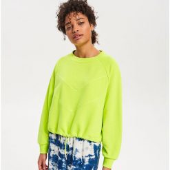 Neonowa bluza - Żółty. Żółte bluzy damskie Reserved, s, bez wzorów, bez rękawów, bez kaptura. Za 89,99 zł.