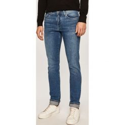 Armani Exchange - Jeansy J13. Niebieskie jeansy męskie Armani Exchange, bez wzorów. Za 479,90 zł.