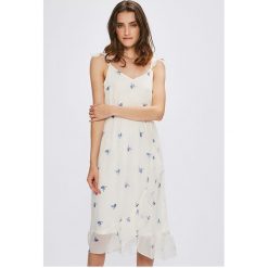 Vero Moda - Sukienka Danni. Białe sukienki damskie Vero Moda, na co dzień, s, bez wzorów, z poliesteru, casualowe, bez kołnierzyka, bez rękawów, midi, rozkloszowane. W wyprzedaży za 49,90 zł.