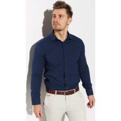 Koszula Edward Orlovski Navy-Blue. Niebieskie koszule męskie Edward Orlovski, m, bez wzorów, z bawełny, eleganckie, bez kołnierzyka, z długim rękawem. Za 130,00 zł.