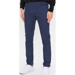 Spodnie regular fit - Granatowy. Niebieskie spodnie męskie House, s, bez wzorów. Za 89,99 zł.