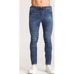 Granatowe jeansy Diesel Bakari. Niebieskie jeansy męskie Diesel, m, z aplikacjami. Za 564,50 zł.