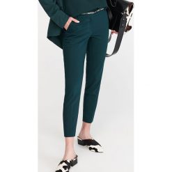 Spodnie z paskiem - Khaki. Spodnie damskie Reserved. Za 99,99 zł.