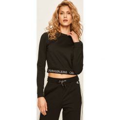 Calvin Klein Jeans - Longsleeve. Czarne bluzki damskie Calvin Klein Jeans, s, bez wzorów, z elastanu, casualowe, z okrągłym kołnierzem. Za 299,90 zł.
