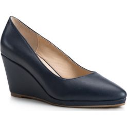 Buty damskie 84-D-900-7. Niebieskie koturny damskie Wittchen, bez obcasa, na koturnie, bez zapięcia. Za 169,00 zł.