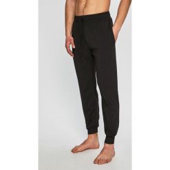 Calvin Klein Underwear - Piżama. Czarne piżamy męskie Calvin Klein Underwear, l, bez wzorów, z elastanu, bez rękawów. W wyprzedaży za 189,90 zł.