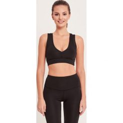 Cardio Bunny - Biustonosz sportowy Buddha. Różowe biustonosze sportowe damskie Cardio Bunny, s, bez wzorów, z elastanu. W wyprzedaży za 119,90 zł.