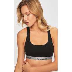 Reebok - Biustonosz sportowy. Czarne biustonosze sportowe damskie Reebok, s, bez wzorów, z elastanu. Za 79,90 zł.