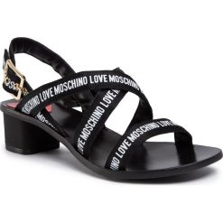 Sandały LOVE MOSCHINO - JA16194C0AJU0000 Nero. Czarne klapki damskie Love Moschino, bez wzorów, ze skóry ekologicznej, bez obcasa, na obcasie. W wyprzedaży za 479,00 zł.