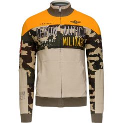 Bluza AERONAUTICA MILITARE Beżowy|Pomarańczowy|Print. Pomarańczowe bluzy męskie marki Aeronautica Militare, l, z aplikacjami, z dzianiny, militarne, z włoskim kołnierzykiem, bez rękawów, bez kaptura. Za 1030,00 zł.