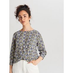 Wzorzysta bluzka - Czarny. Czarne bluzki damskie Cropp, s, bez wzorów, bez kołnierzyka, bez rękawów. Za 59,99 zł.