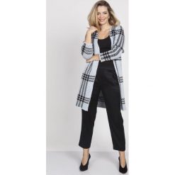 Płaszcz swetrowy w kratę - 36/38. Płaszcze damskie e-margeritka.pl, bez wzorów, z poliesteru, eleganckie, bez rękawów, bez kaptura. Za 179,99 zł.