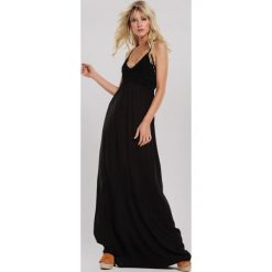 Czarna Sukienka Dancemaker. Czarne sukienki damskie Renee, s, bez wzorów, boho, bez kołnierzyka, bez rękawów, maxi, rozkloszowane. Za 119,99 zł.