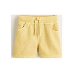 Mango Kids - Szorty dziecięce Saipan 80-104 cm. Żółte spodenki chłopięce Mango Kids, bez wzorów, z bawełny, casualowe. W wyprzedaży za 29,90 zł.