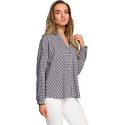 Koszula tunika oversize w kratkę - czarna. Czarne tuniki damskie Moe, do pracy, s, z nadrukiem, z elastanu, eleganckie, z asymetrycznym kołnierzem, bez rękawów. W wyprzedaży za 129,00 zł.