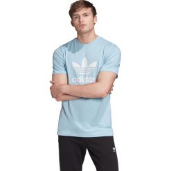 Adidas Originals Trefoil Koszulka Niebieski. Niebieskie podkoszulki męskie adidas Originals, s, z nadrukiem, z bawełny, z krótkim rękawem. Za 111,95 zł.