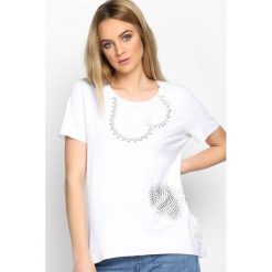 Biały T-shirt Heart On Retreat. Białe t-shirty damskie marki Born2be, l, w koronkowe wzory, z koronki, z okrągłym kołnierzem. Za 54,99 zł.