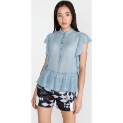 Versace Jeans Bluzka Niebieski. Niebieskie bluzki damskie Versace Jeans, s, bez wzorów, z poliesteru, bez kołnierzyka, bez rękawów. Za 1198,95 zł.