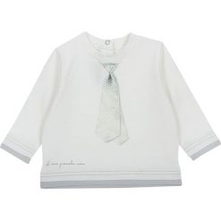Koszulka w kolorze białym. Białe t-shirty chłopięce z nadrukiem marki Chicco, z bawełny, z długim rękawem. W wyprzedaży za 49,95 zł.