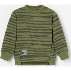 Bluza z dzianiny dresowej z nadrukiem - Khaki. Brązowe bluzy męskie Reserved, m, z nadrukiem, z dzianiny, bez kołnierzyka, bez rękawów, bez kaptura. W wyprzedaży za 24,99 zł.