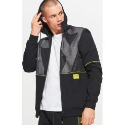 Bluza z kapturem z kolekcji FUUTURISTIC YOUTH - Czarny. Czarne bluzy męskie z kapturem marki Cropp, s. Za 139,99 zł.