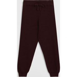 Mango Kids - Spodnie dziecięce Jog 110-164 cm. Brązowe spodnie dziewczęce Mango Kids, bez wzorów, z bawełny. Za 79,99 zł.