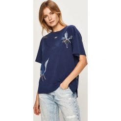 G-Star Raw - T-shirt. Niebieskie bluzki damskie G-Star RAW, s, z nadrukiem, z bawełny, z okrągłym kołnierzem. W wyprzedaży za 199,90 zł.